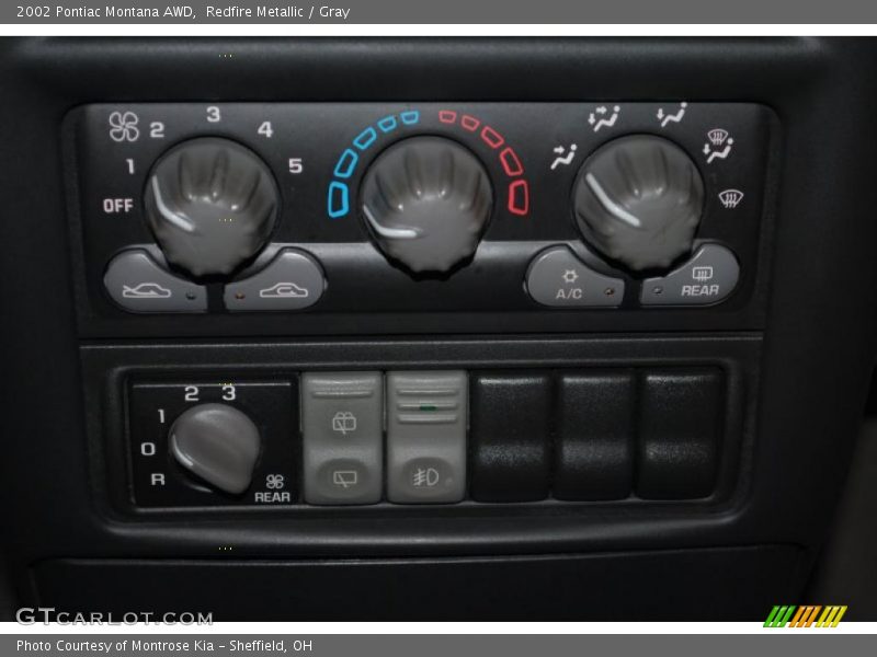Redfire Metallic / Gray 2002 Pontiac Montana AWD