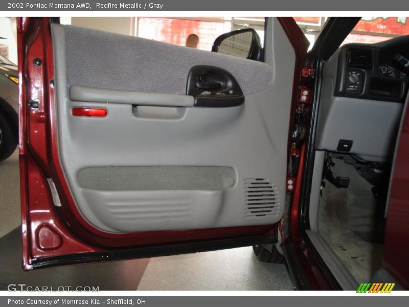 Redfire Metallic / Gray 2002 Pontiac Montana AWD