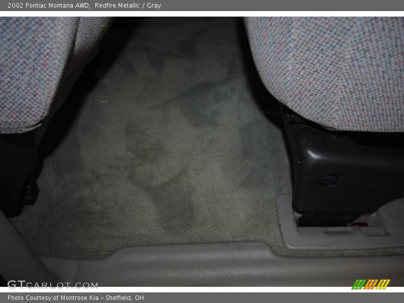 Redfire Metallic / Gray 2002 Pontiac Montana AWD
