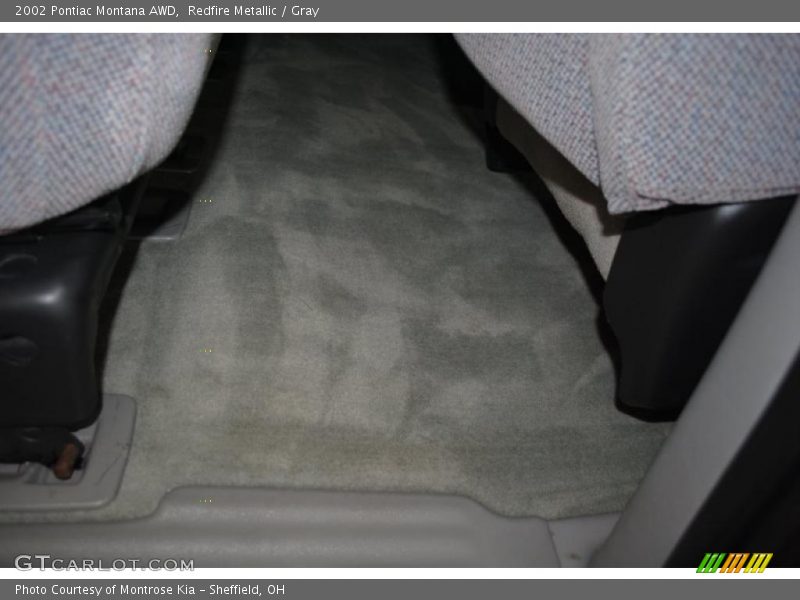 Redfire Metallic / Gray 2002 Pontiac Montana AWD