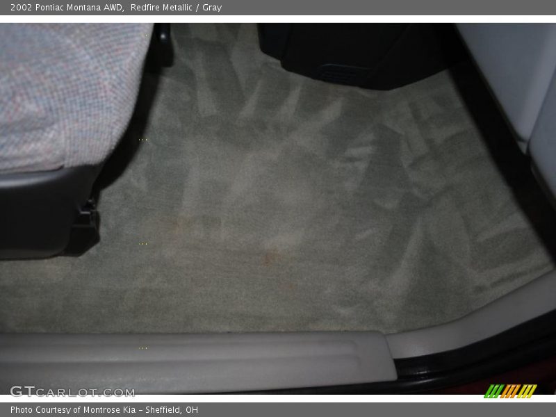 Redfire Metallic / Gray 2002 Pontiac Montana AWD