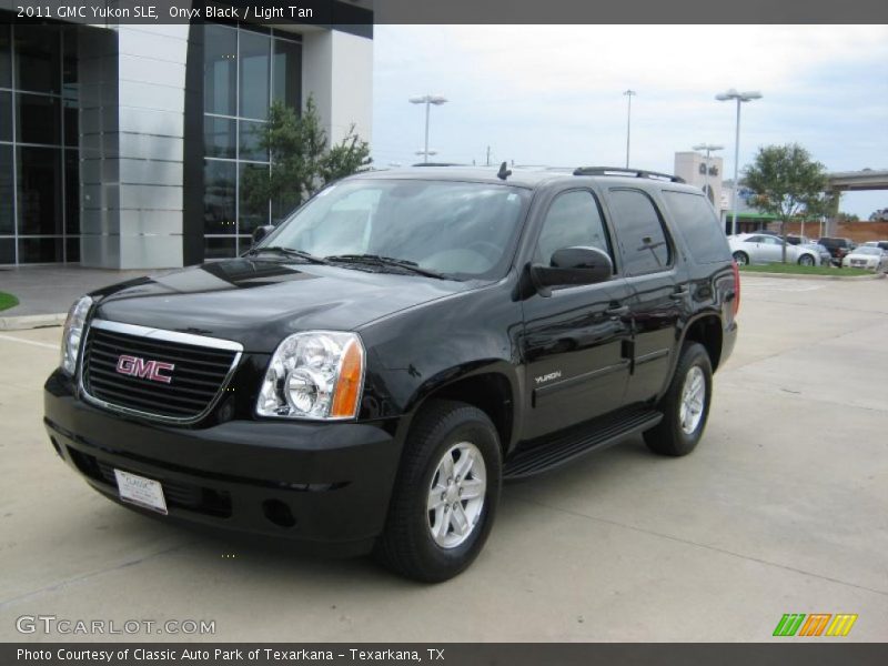 Onyx Black / Light Tan 2011 GMC Yukon SLE