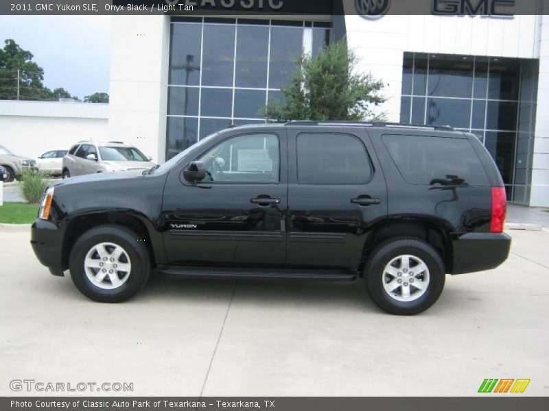 Onyx Black / Light Tan 2011 GMC Yukon SLE