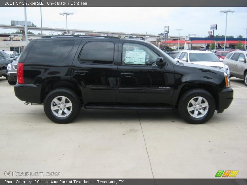 Onyx Black / Light Tan 2011 GMC Yukon SLE