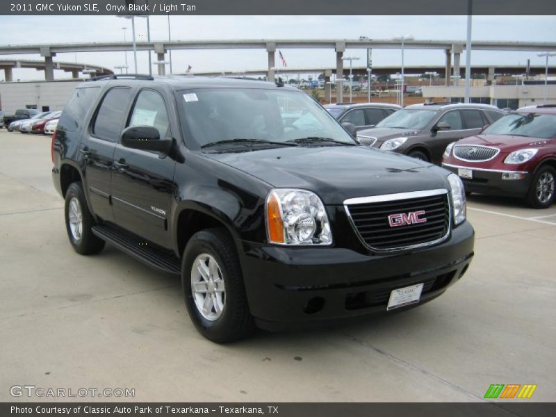 Onyx Black / Light Tan 2011 GMC Yukon SLE