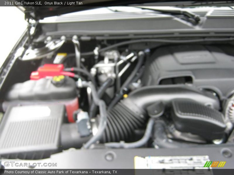 Onyx Black / Light Tan 2011 GMC Yukon SLE