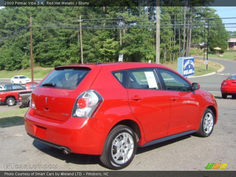 Red Hot Metallic / Ebony 2009 Pontiac Vibe 2.4