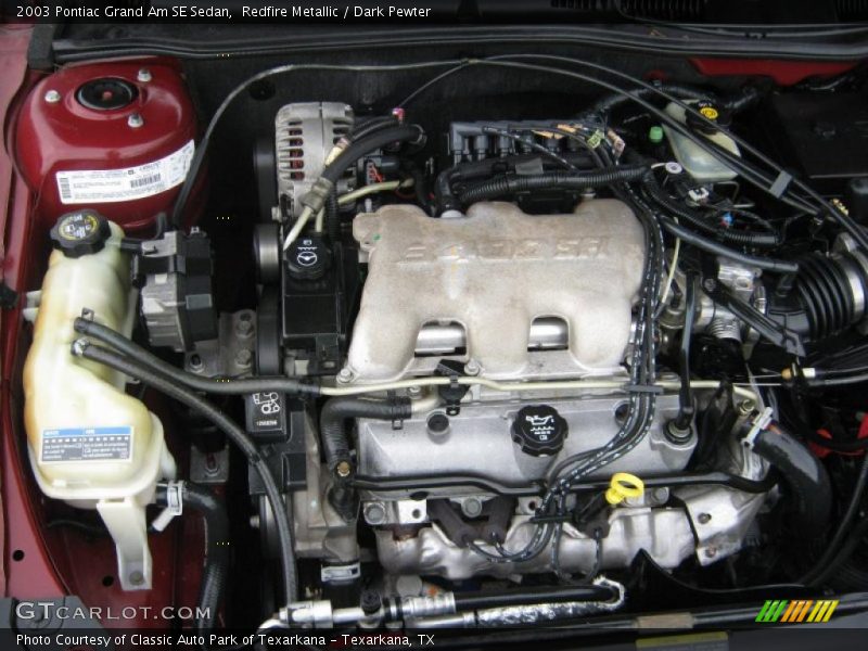 Redfire Metallic / Dark Pewter 2003 Pontiac Grand Am SE Sedan