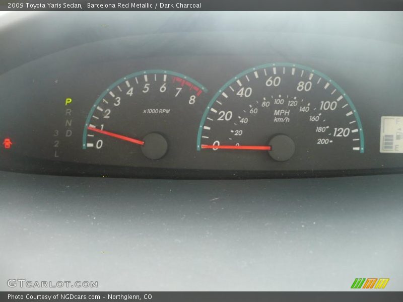Barcelona Red Metallic / Dark Charcoal 2009 Toyota Yaris Sedan
