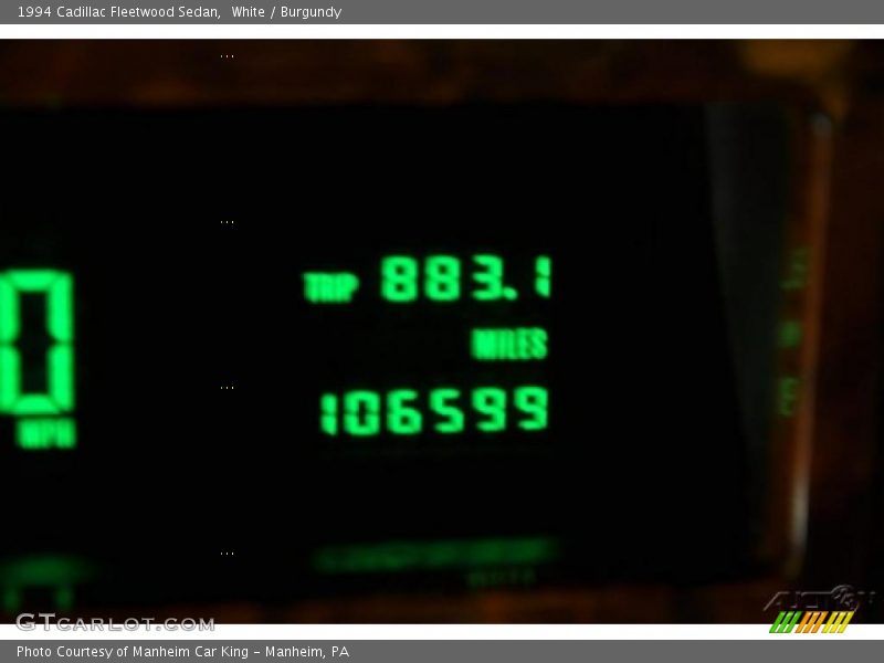 White / Burgundy 1994 Cadillac Fleetwood Sedan