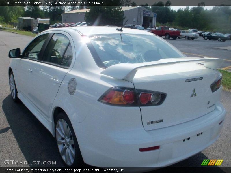 Wicked White Metallic / Black 2010 Mitsubishi Lancer GTS