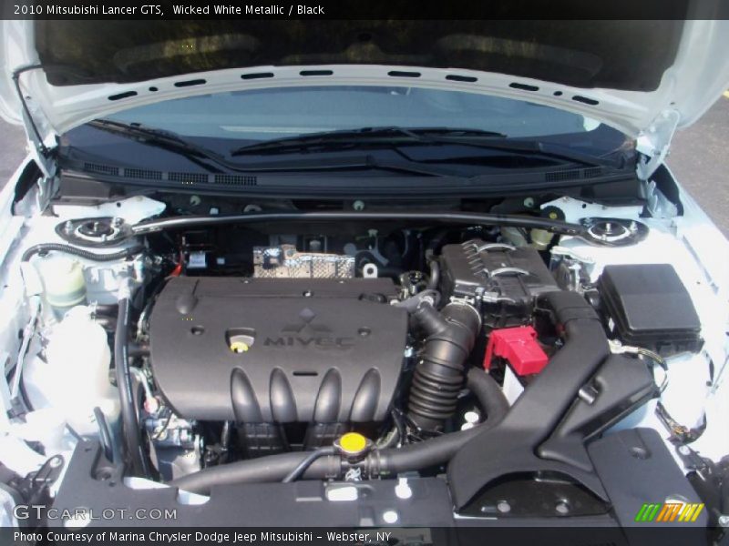 Wicked White Metallic / Black 2010 Mitsubishi Lancer GTS
