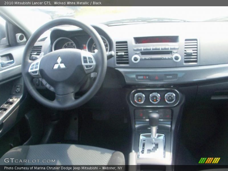Wicked White Metallic / Black 2010 Mitsubishi Lancer GTS