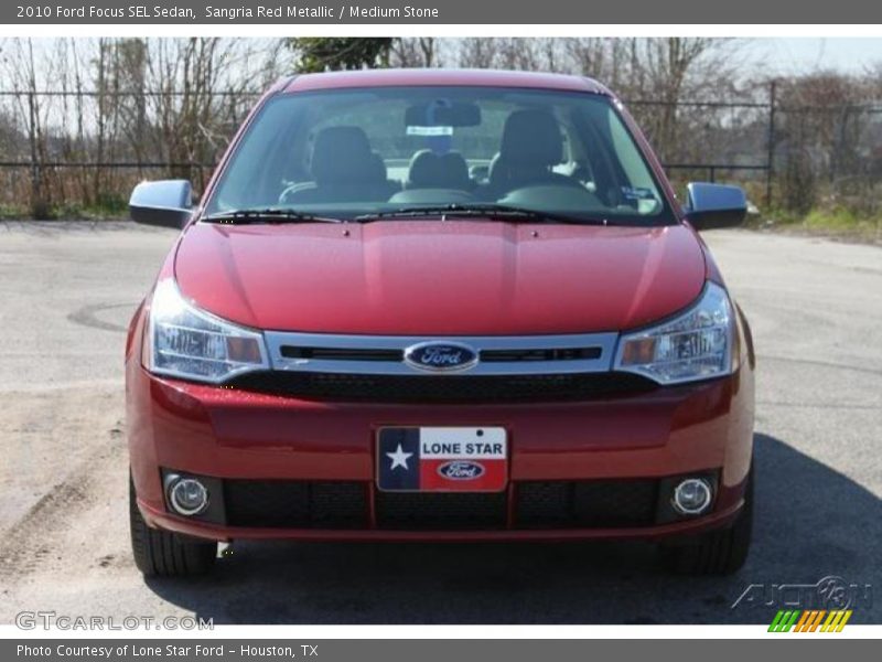 Sangria Red Metallic / Medium Stone 2010 Ford Focus SEL Sedan