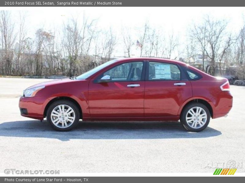 Sangria Red Metallic / Medium Stone 2010 Ford Focus SEL Sedan
