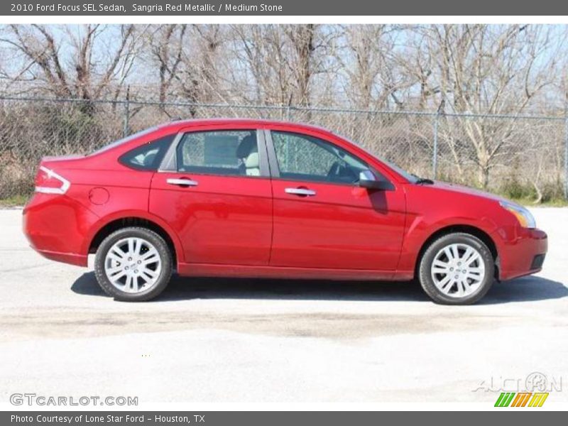 Sangria Red Metallic / Medium Stone 2010 Ford Focus SEL Sedan