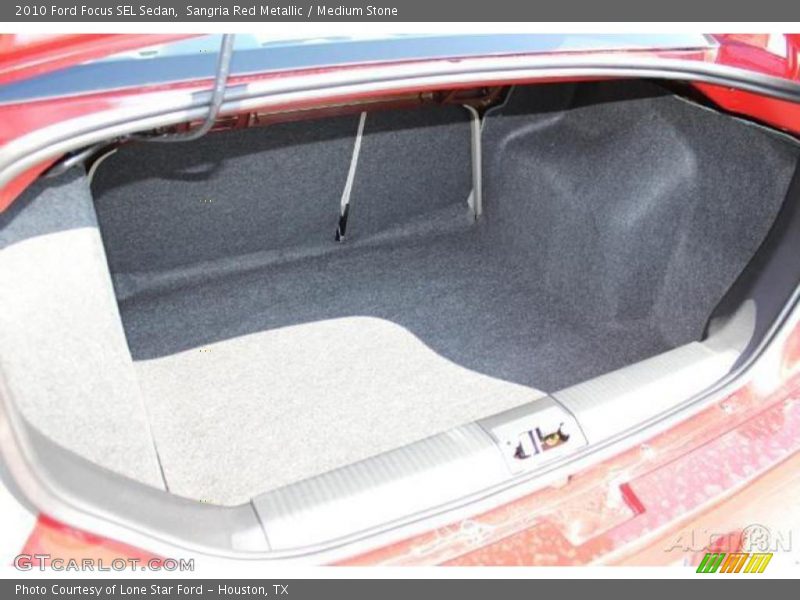 Sangria Red Metallic / Medium Stone 2010 Ford Focus SEL Sedan