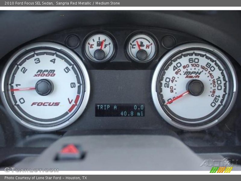 Sangria Red Metallic / Medium Stone 2010 Ford Focus SEL Sedan