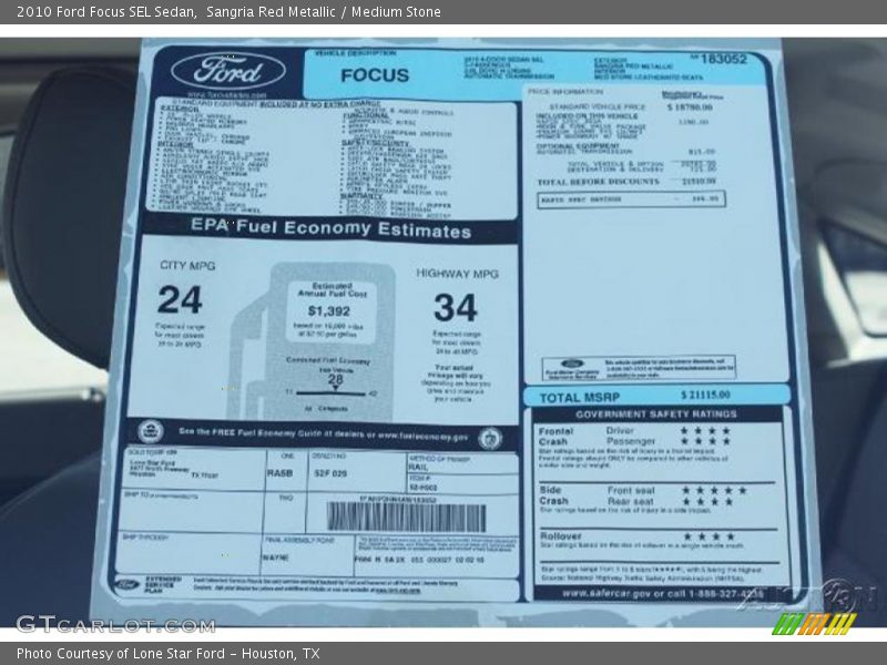Sangria Red Metallic / Medium Stone 2010 Ford Focus SEL Sedan