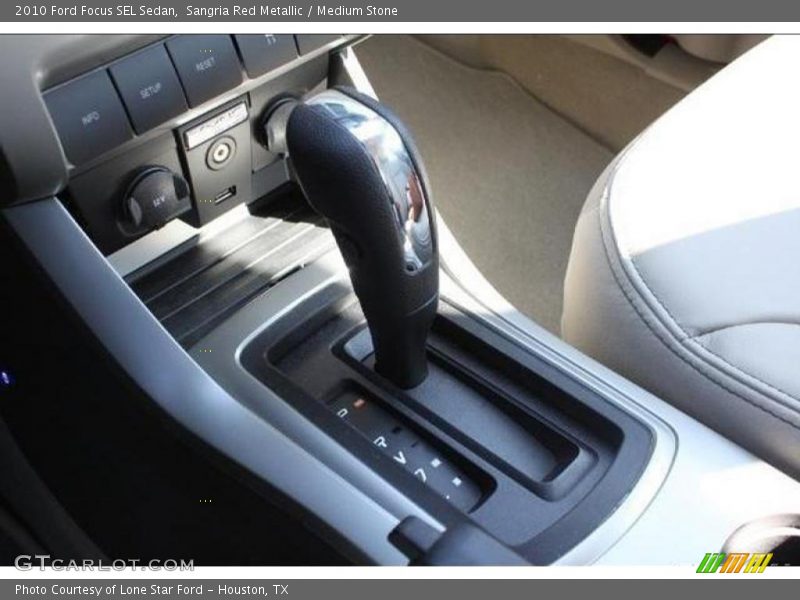 Sangria Red Metallic / Medium Stone 2010 Ford Focus SEL Sedan