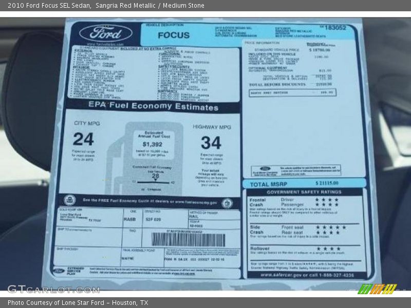 Sangria Red Metallic / Medium Stone 2010 Ford Focus SEL Sedan