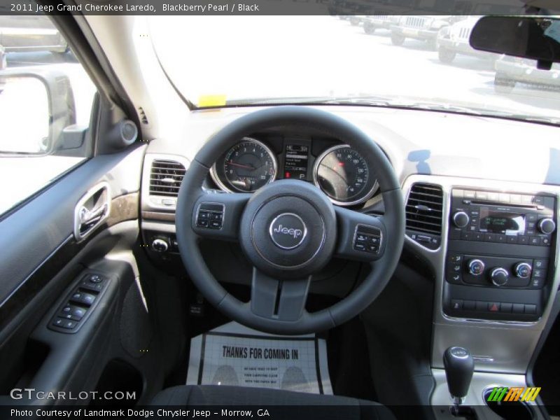 Blackberry Pearl / Black 2011 Jeep Grand Cherokee Laredo