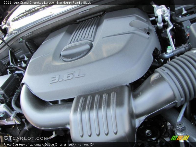 Blackberry Pearl / Black 2011 Jeep Grand Cherokee Laredo