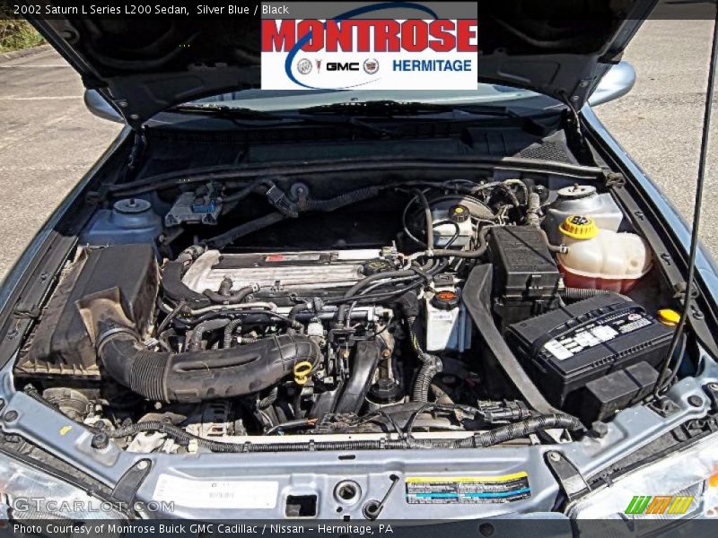 Silver Blue / Black 2002 Saturn L Series L200 Sedan