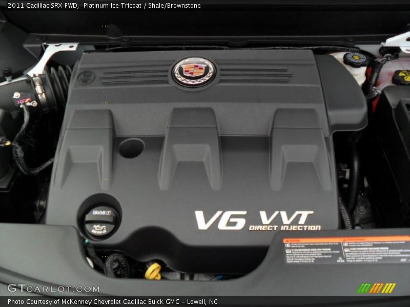 Platinum Ice Tricoat / Shale/Brownstone 2011 Cadillac SRX FWD