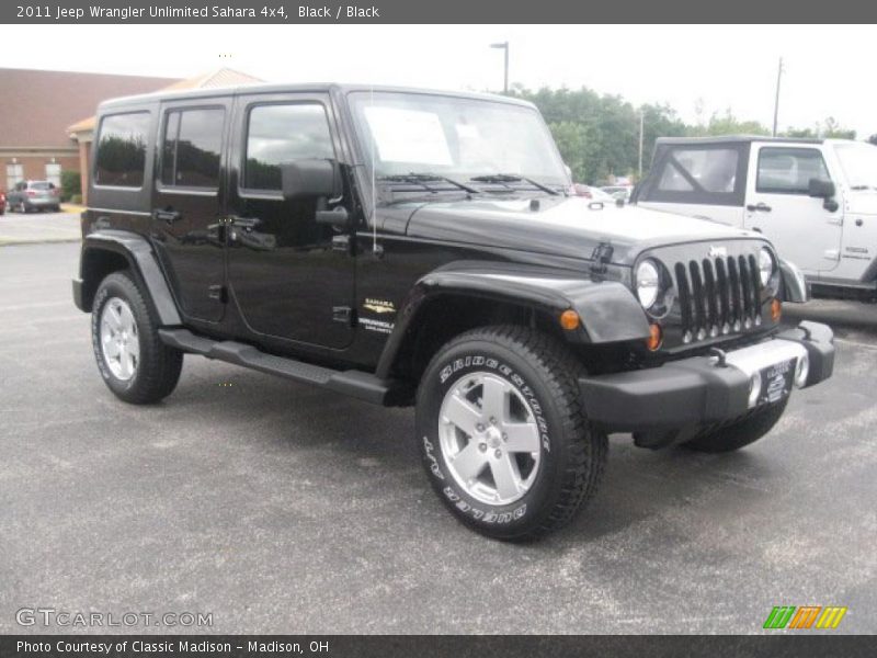 Black / Black 2011 Jeep Wrangler Unlimited Sahara 4x4