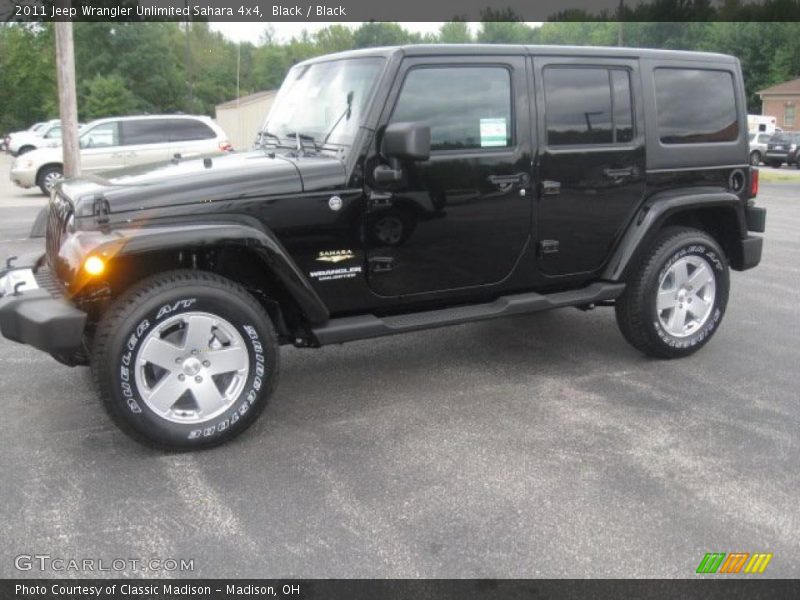 Black / Black 2011 Jeep Wrangler Unlimited Sahara 4x4