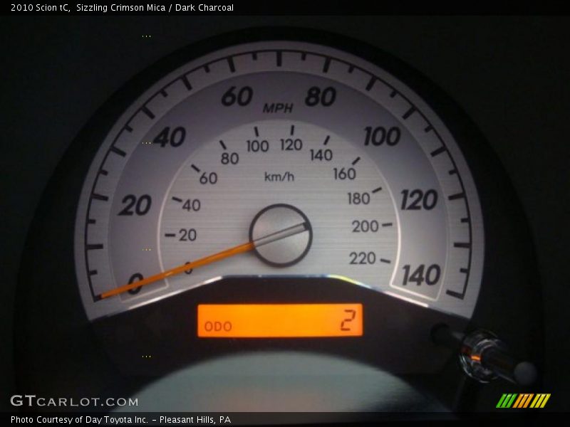 Sizzling Crimson Mica / Dark Charcoal 2010 Scion tC