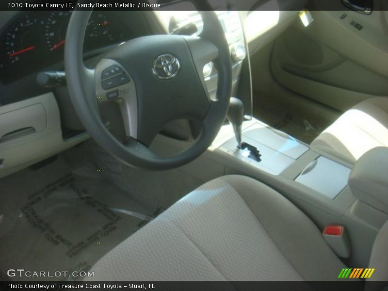Sandy Beach Metallic / Bisque 2010 Toyota Camry LE