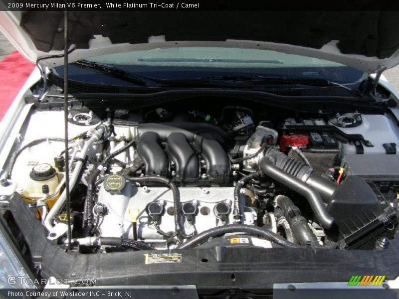 White Platinum Tri-Coat / Camel 2009 Mercury Milan V6 Premier