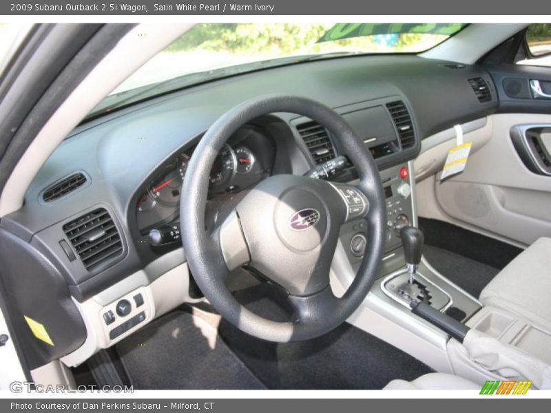 Satin White Pearl / Warm Ivory 2009 Subaru Outback 2.5i Wagon