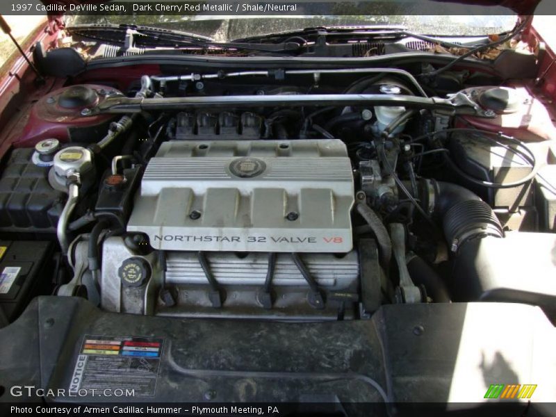 Dark Cherry Red Metallic / Shale/Neutral 1997 Cadillac DeVille Sedan