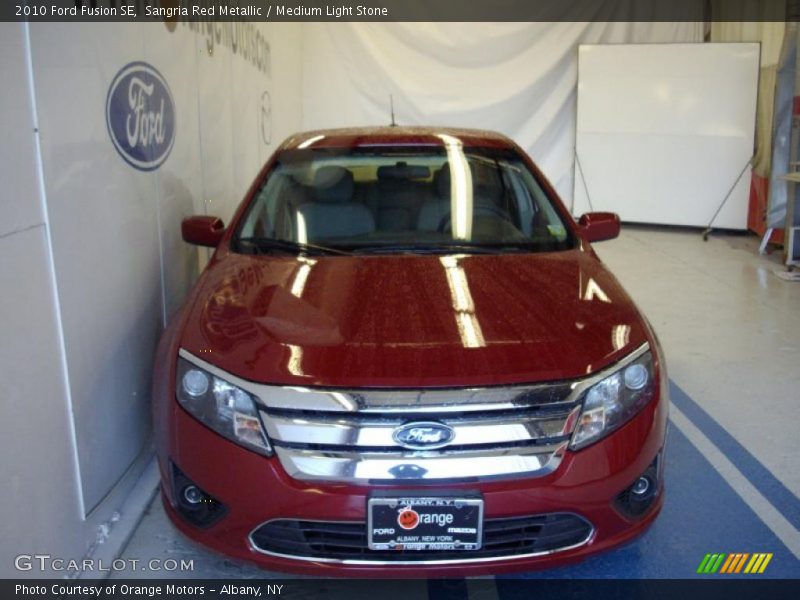 Sangria Red Metallic / Medium Light Stone 2010 Ford Fusion SE