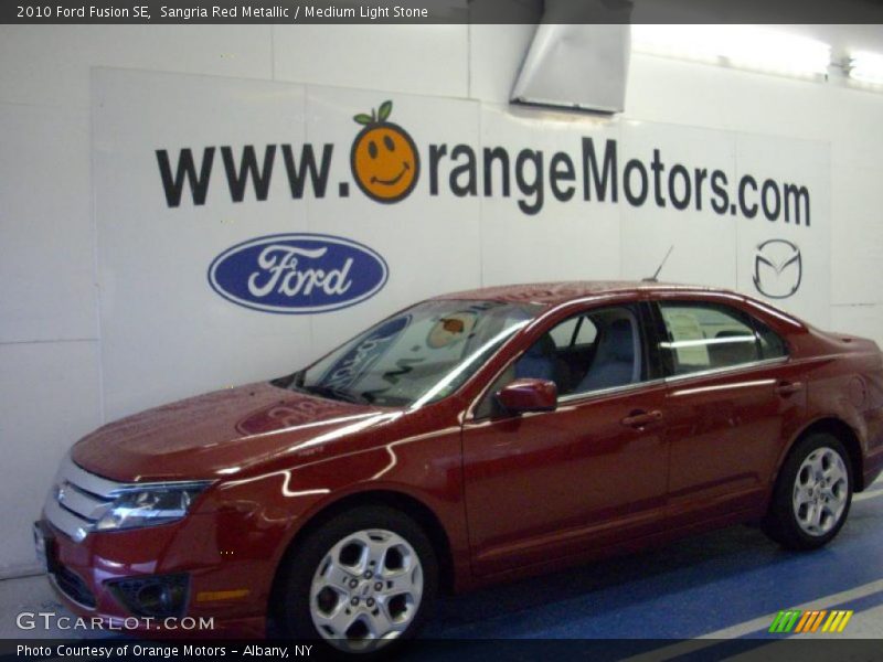 Sangria Red Metallic / Medium Light Stone 2010 Ford Fusion SE