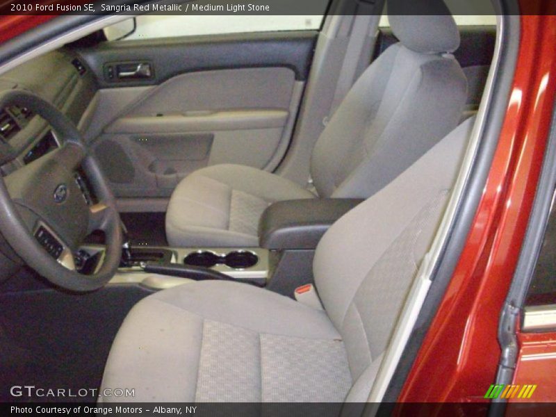 Sangria Red Metallic / Medium Light Stone 2010 Ford Fusion SE