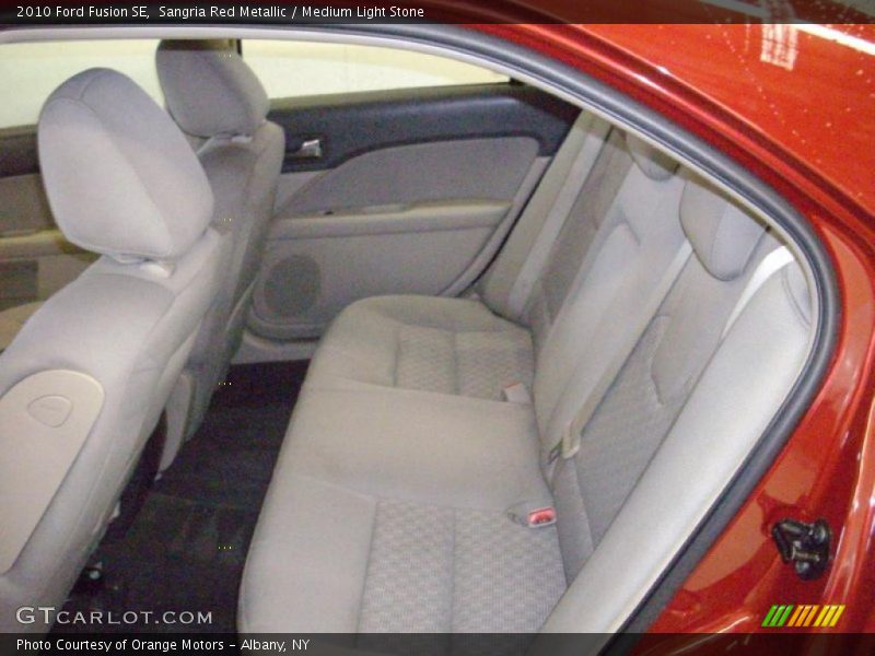 Sangria Red Metallic / Medium Light Stone 2010 Ford Fusion SE