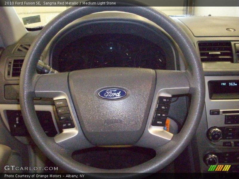 Sangria Red Metallic / Medium Light Stone 2010 Ford Fusion SE