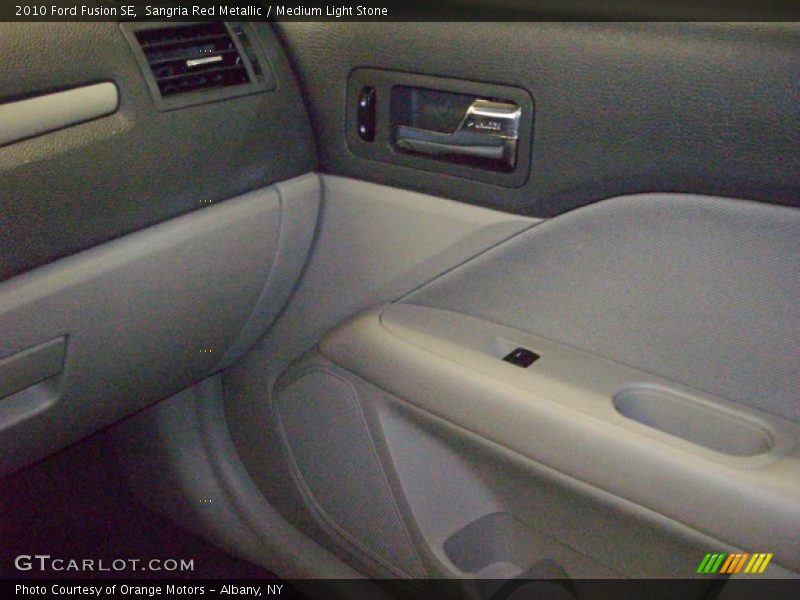Sangria Red Metallic / Medium Light Stone 2010 Ford Fusion SE
