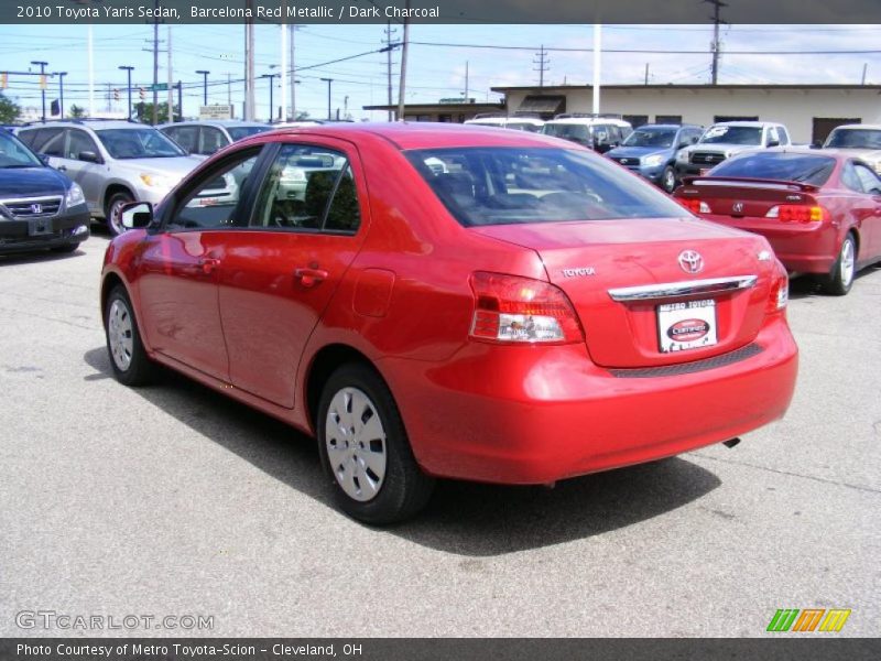 Barcelona Red Metallic / Dark Charcoal 2010 Toyota Yaris Sedan