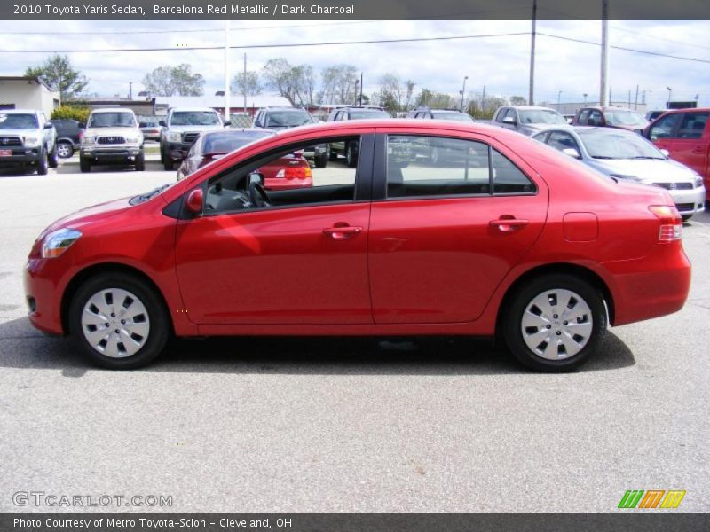 Barcelona Red Metallic / Dark Charcoal 2010 Toyota Yaris Sedan