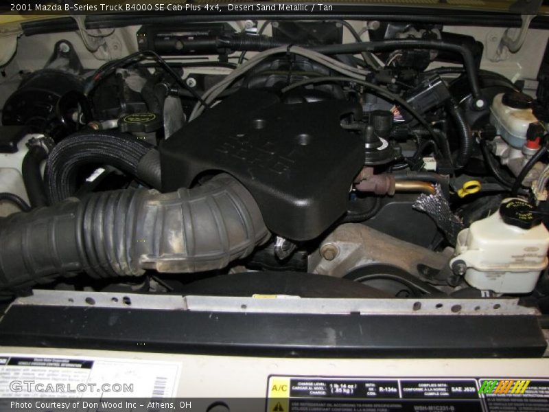 Desert Sand Metallic / Tan 2001 Mazda B-Series Truck B4000 SE Cab Plus 4x4