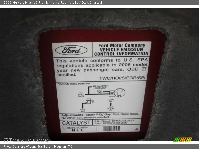 Vivid Red Metallic / Dark Charcoal 2006 Mercury Milan V6 Premier