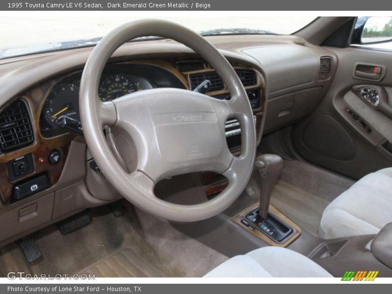 Dark Emerald Green Metallic / Beige 1995 Toyota Camry LE V6 Sedan