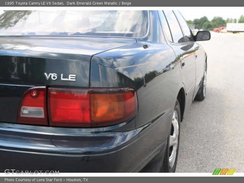 Dark Emerald Green Metallic / Beige 1995 Toyota Camry LE V6 Sedan