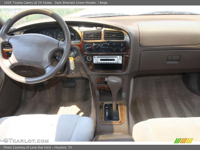 Dark Emerald Green Metallic / Beige 1995 Toyota Camry LE V6 Sedan