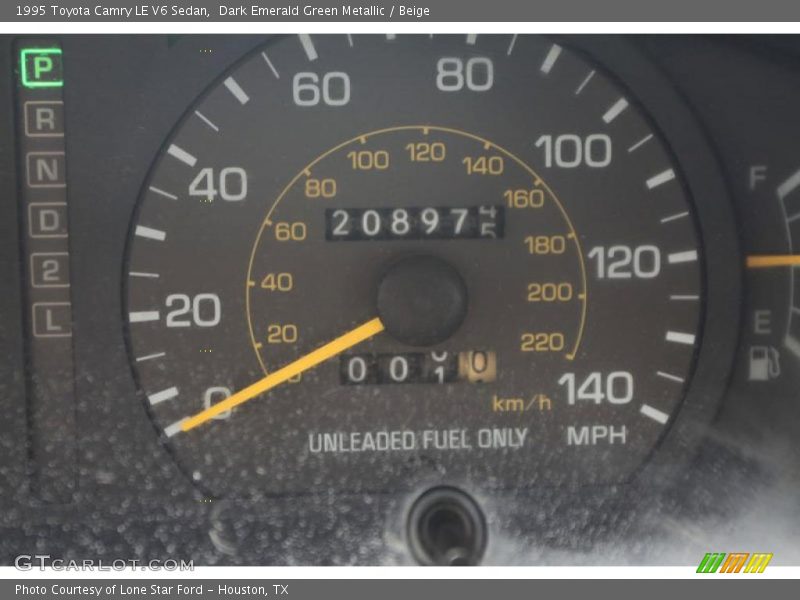 Dark Emerald Green Metallic / Beige 1995 Toyota Camry LE V6 Sedan